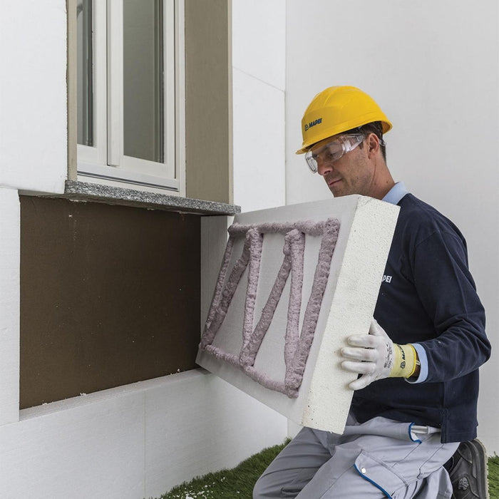 Aplicación de espuma adhesiva Mapepur en sistema EIFS